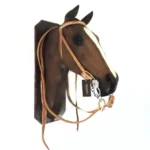 Cabezada y riendas de cuero crudo cosida con tiento