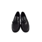 Mocasín clásico doble suela con pompón negro