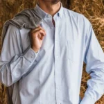 Camisa tela Oxford lisa celeste para hombre